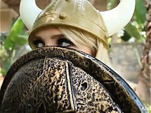 Viking Alix drills herself with a unicorn horn